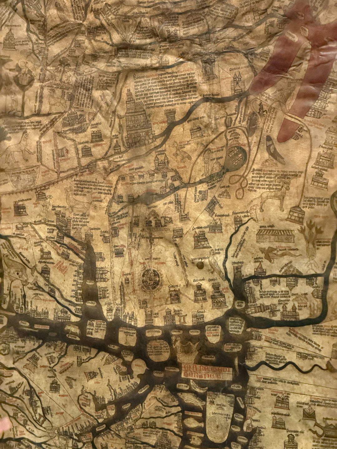 Intricate ancient map drawn on aged parchment paper.